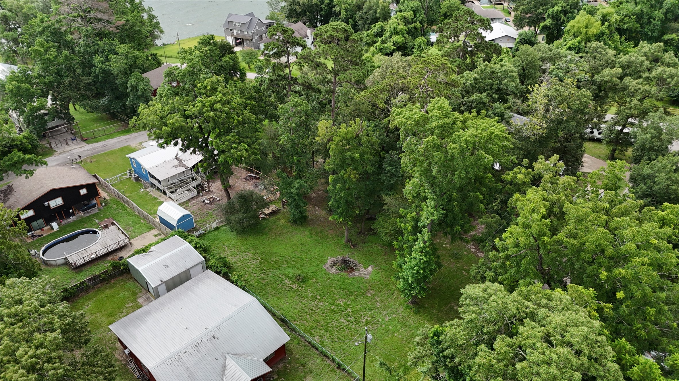0 Walnut Lane Point Blank, TX 77364 - Photo 8 of 11 Natural surroundings in this serene Lake Livingston neighborhood setting.