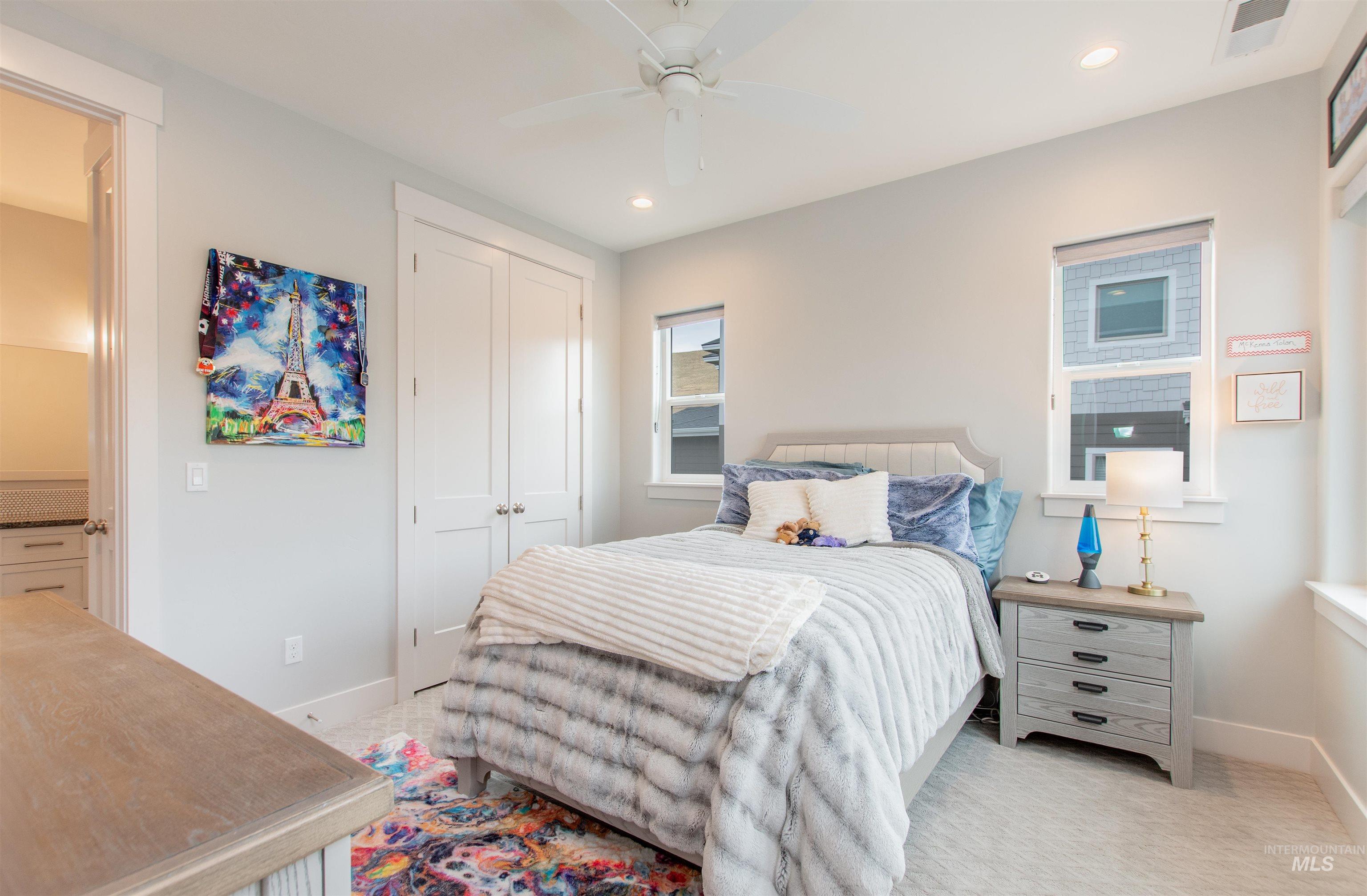 2400 South Trapper Place Boise, ID 83716 - Photo 32 of 50 Bedroom with a closet, a ceiling fan, light carpet, and recessed lighting