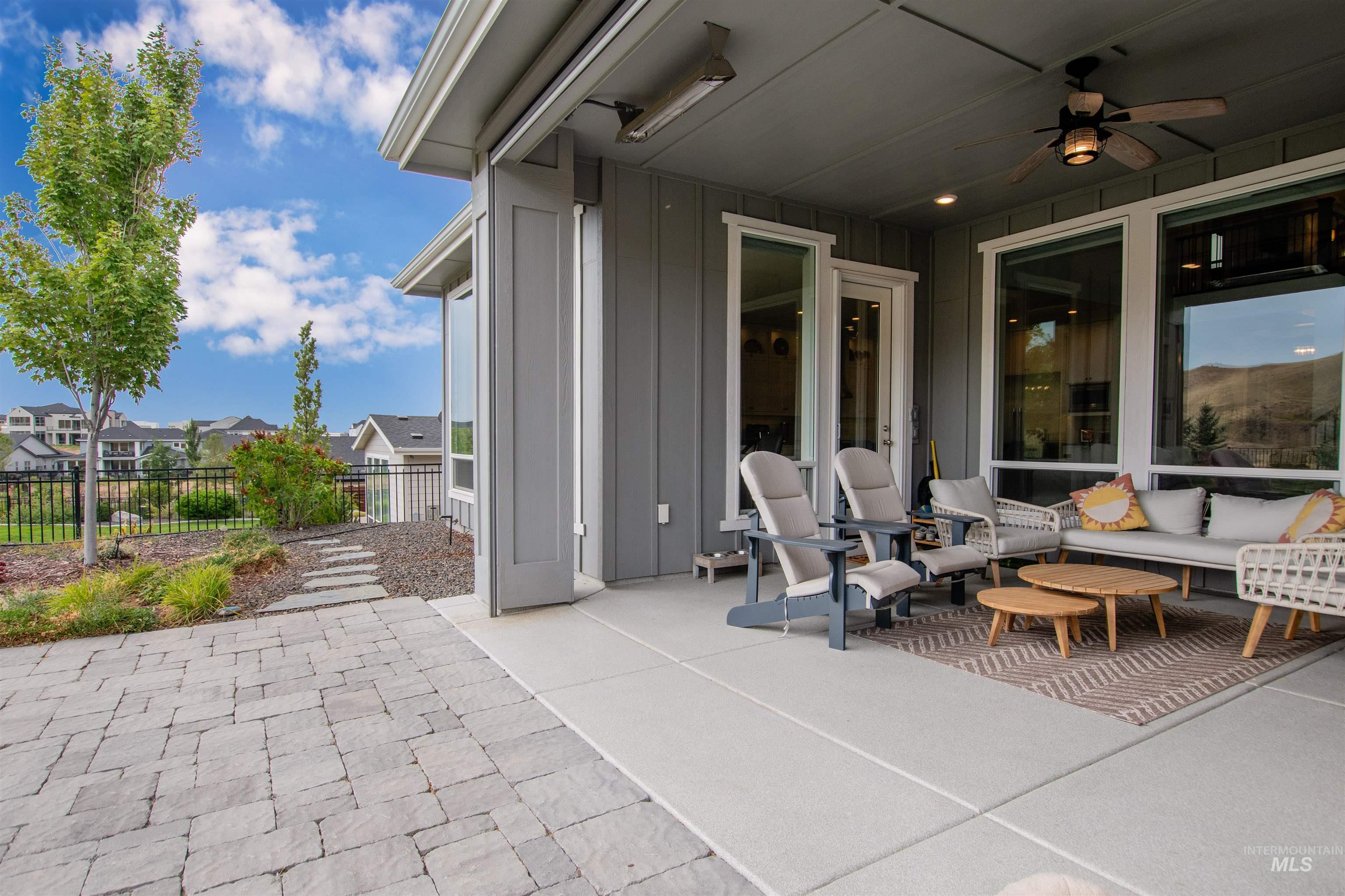 2400 South Trapper Place Boise, ID 83716 - Photo 37 of 50 View of patio / terrace featuring a ceiling fan and a residential view