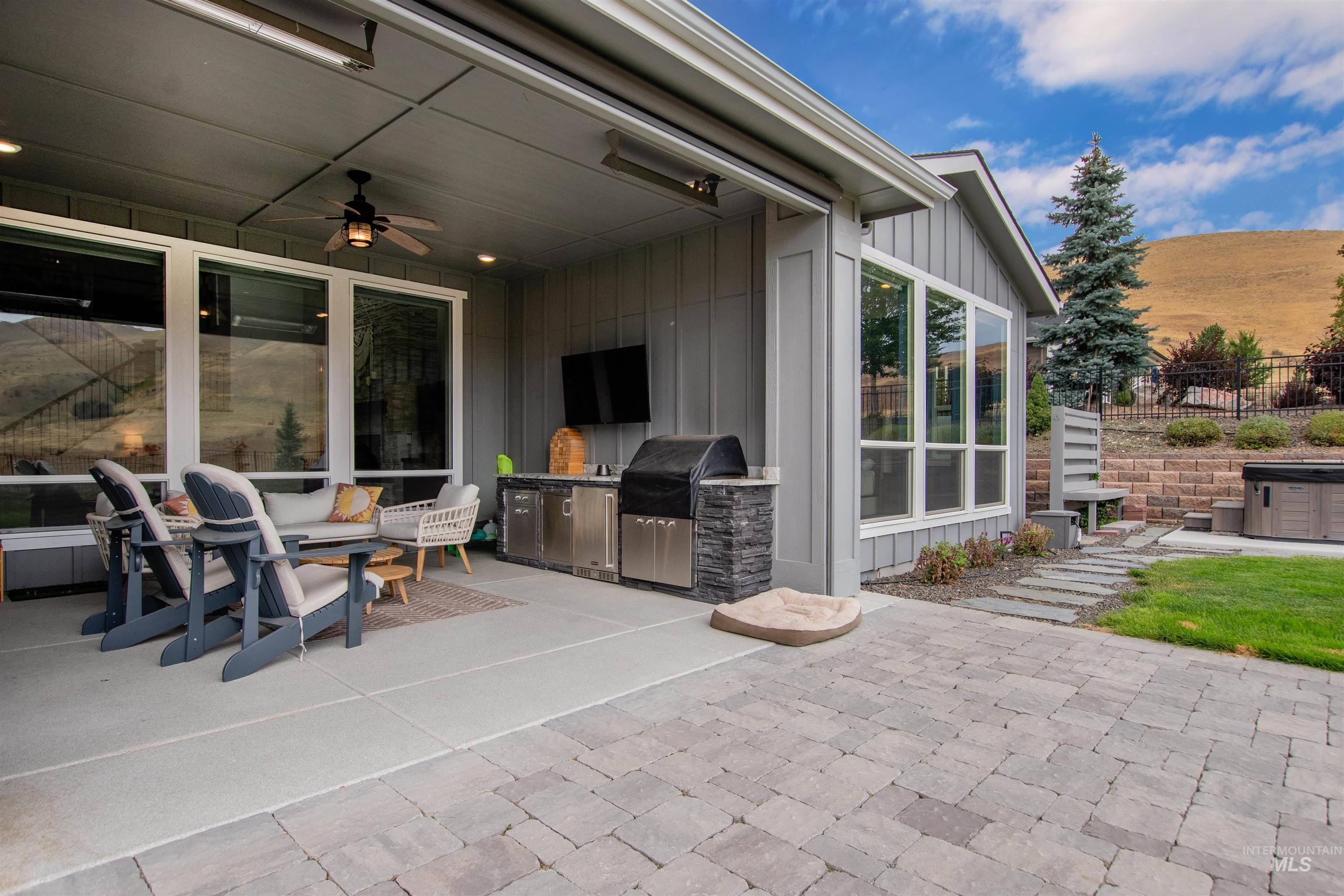 2400 South Trapper Place Boise, ID 83716 - Photo 39 of 50 View of patio featuring an outdoor kitchen and ceiling fan