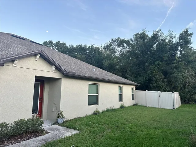 a house view with a garden space