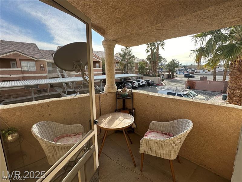 1830 North Pecos Road, Unit 230 Las Vegas, NV 89115 - Photo 15 of 16 An inviting private patio offers a relaxing space overlooking the community.