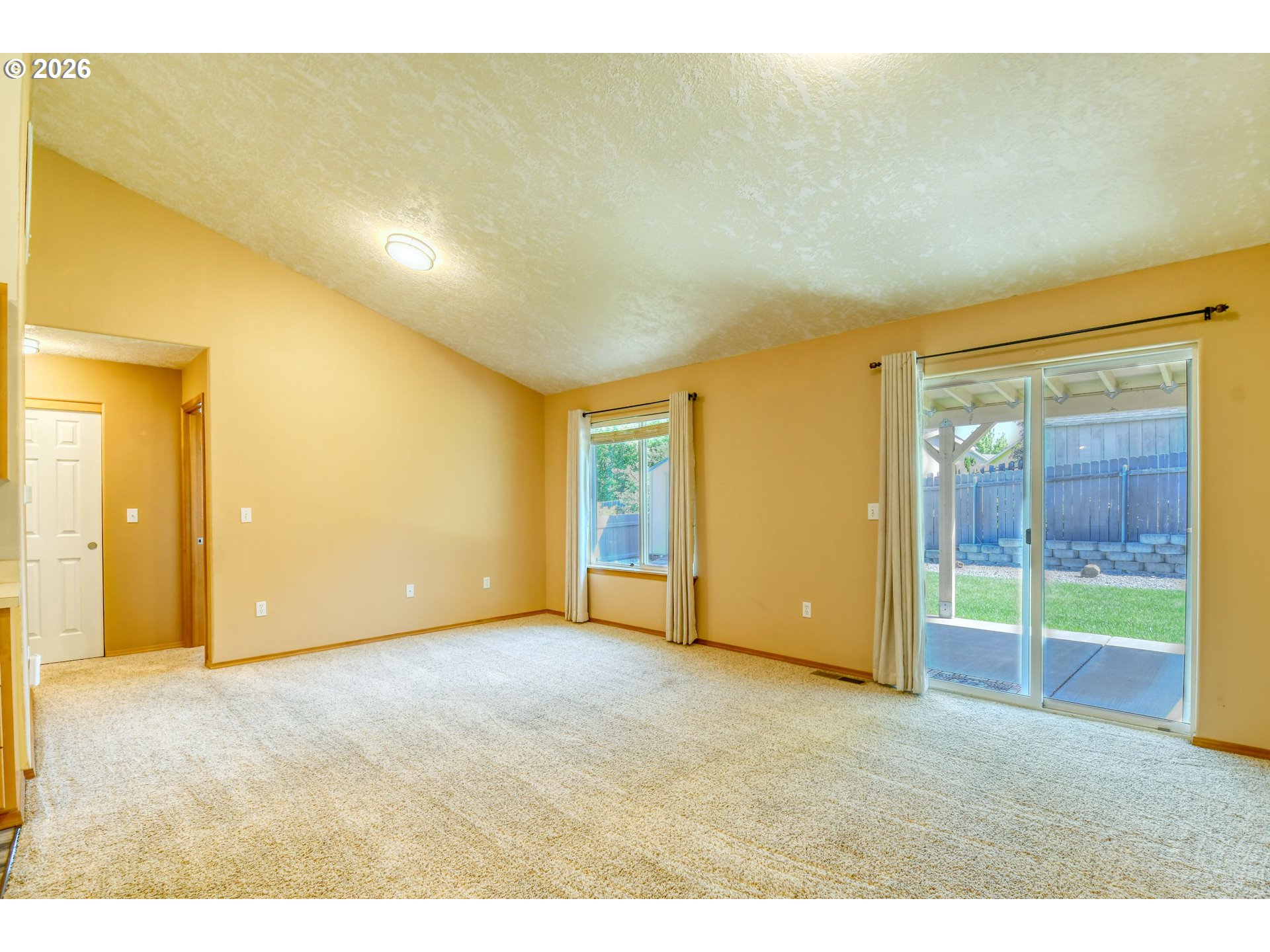 1614 Southwest 3rd Street Pendleton, OR 97801 - Photo 3 of 40 a view of an empty room with glass door