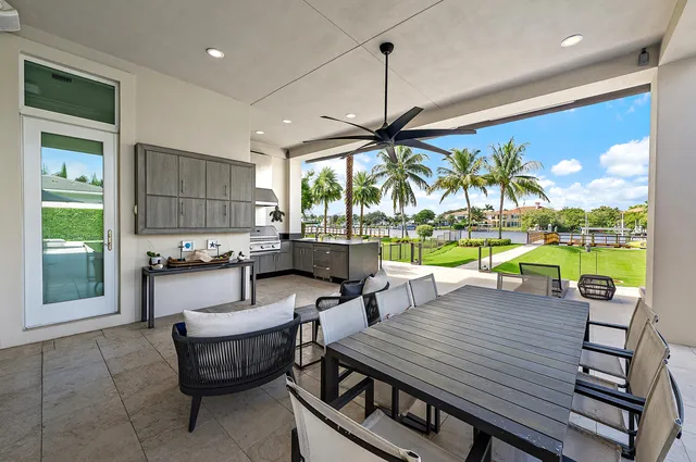 a view of swimming pool with outdoor seating