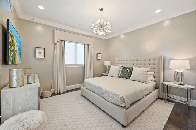 an aerial view of houses with yard