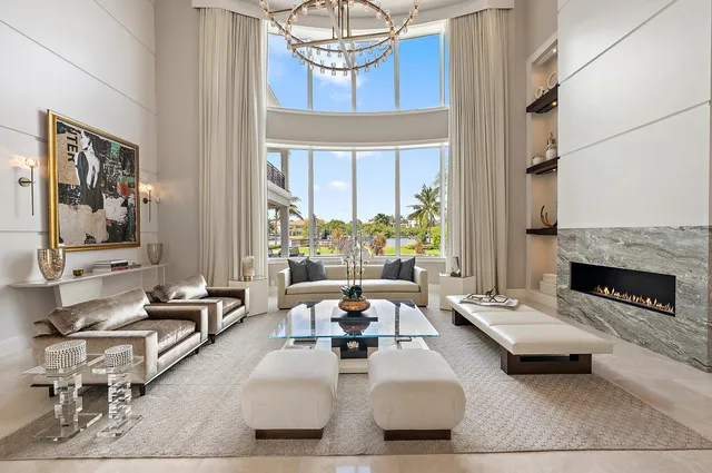 a kitchen with stainless steel appliances granite countertop a stove refrigerator and cabinets