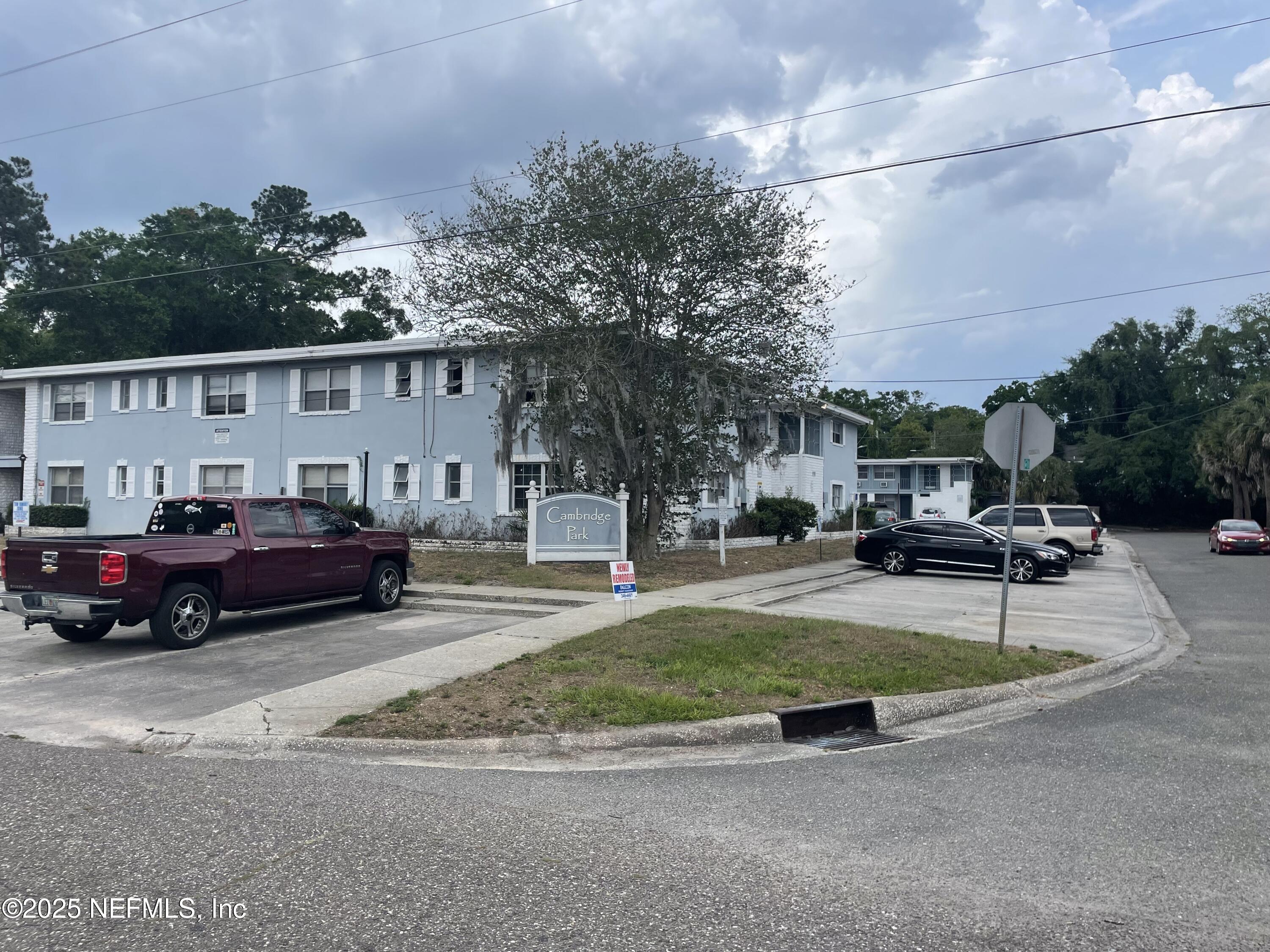1110 Caliente Drive, Unit 52 Jacksonville, FL 32211 - Photo 1 of 12 a view of a cars park in front of house