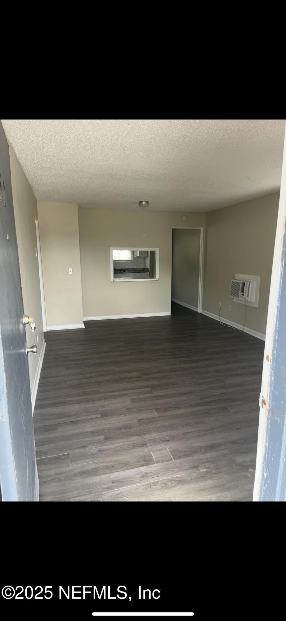 1110 Caliente Drive, Unit 52 Jacksonville, FL 32211 - Photo 7 of 12 a view of a hallway