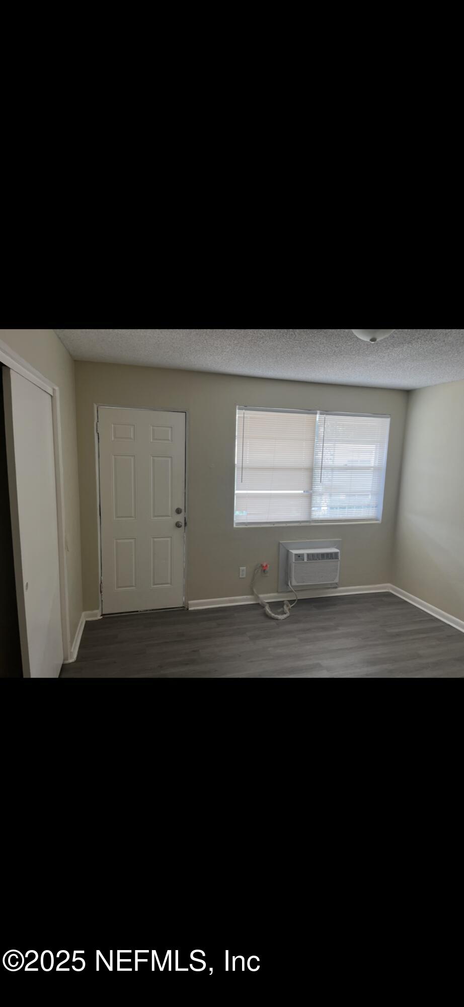 1110 Caliente Drive, Unit 52 Jacksonville, FL 32211 - Photo 9 of 12 a view of wooden floor