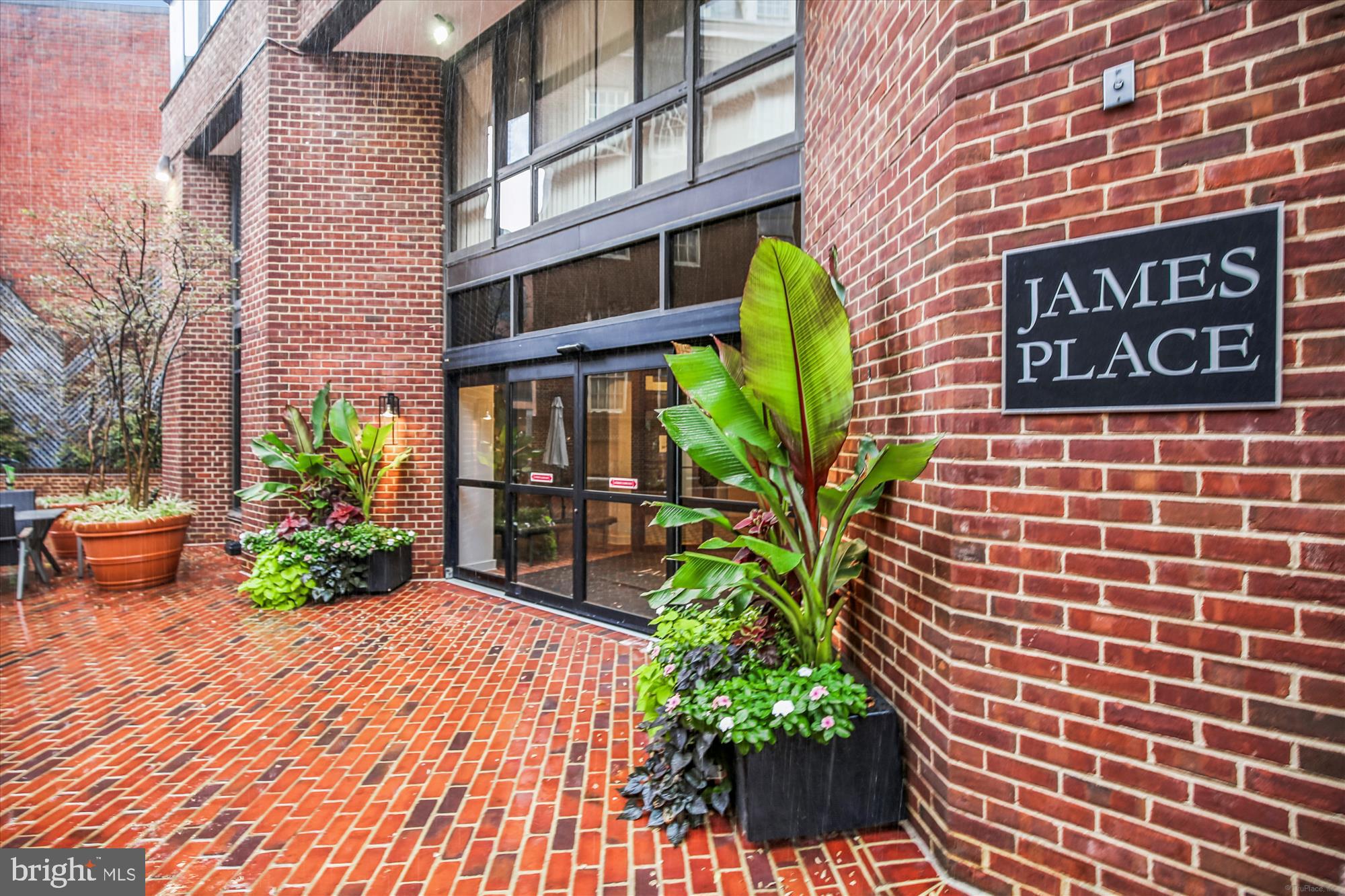 1077 30th Street Northwest, Unit 612 Washington, DC 20007 - Photo 2 of 44 a view of a building with potted plants