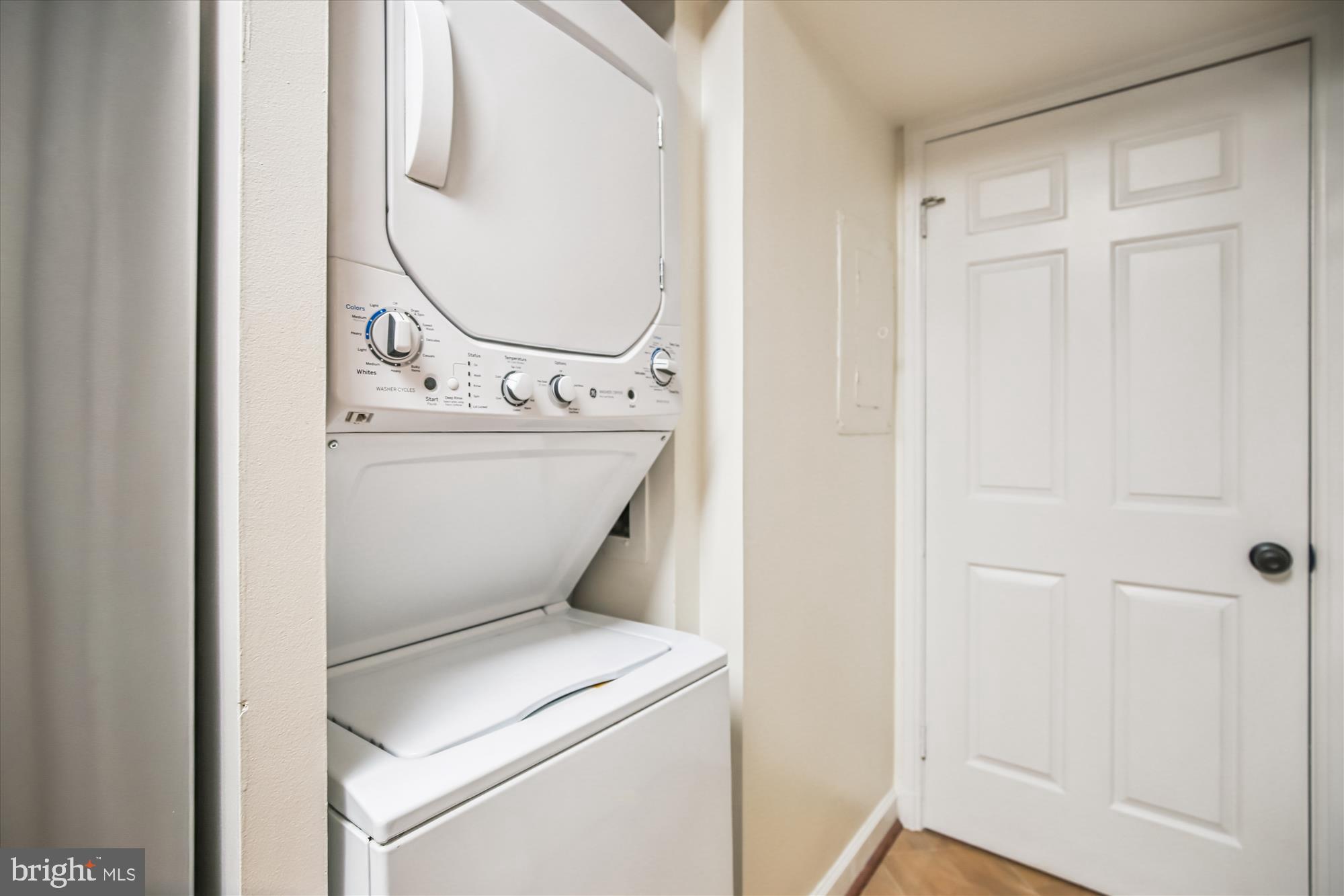 1077 30th Street Northwest, Unit 612 Washington, DC 20007 - Photo 22 of 44 a utility room with dryer and washer