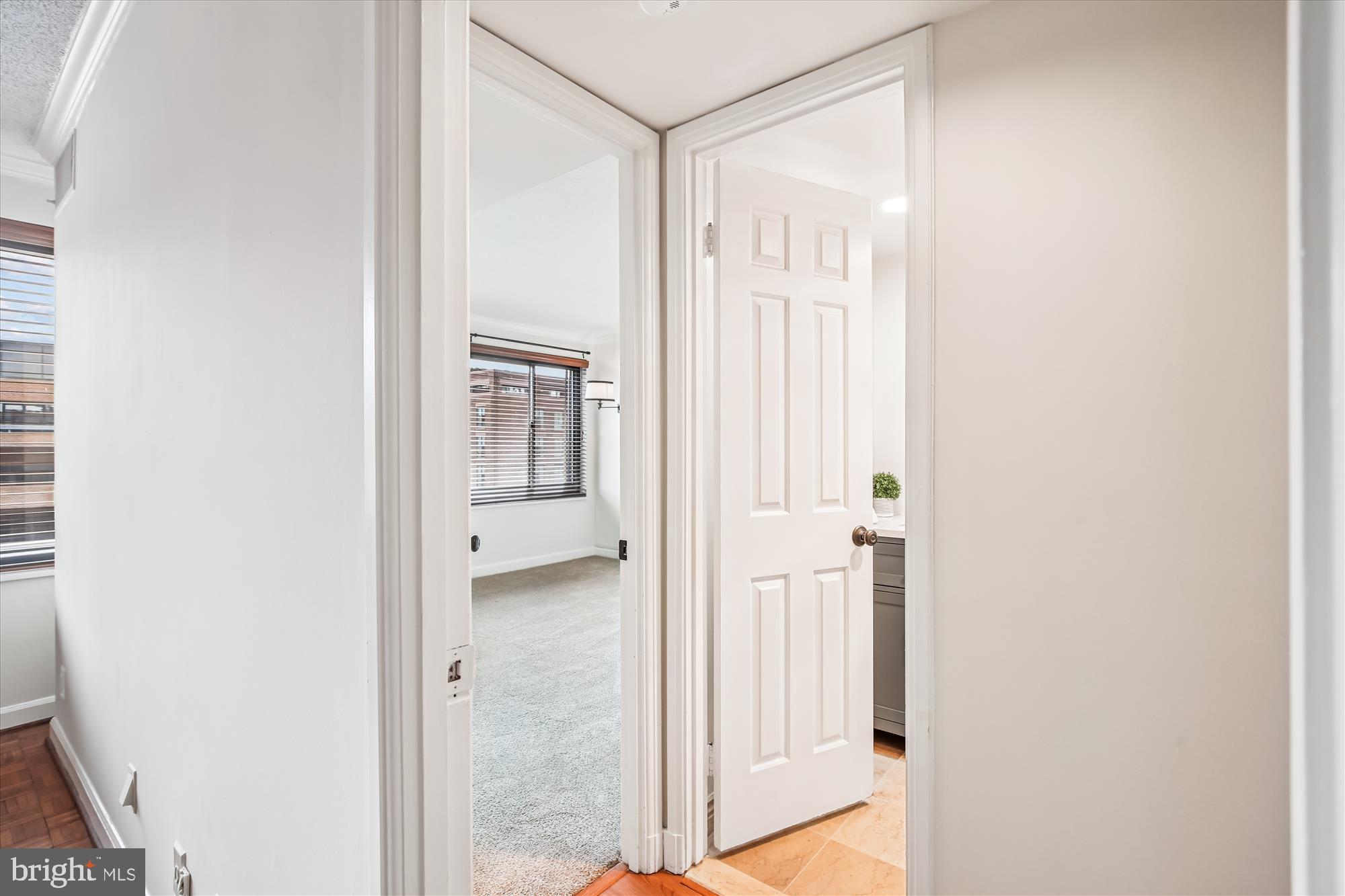 1077 30th Street Northwest, Unit 612 Washington, DC 20007 - Photo 23 of 44 a view of a bathroom with a glass door