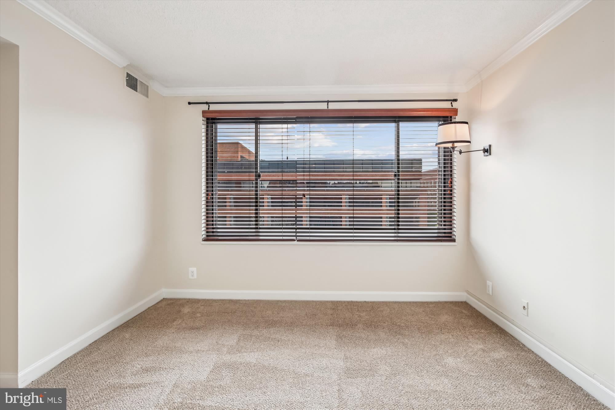 1077 30th Street Northwest, Unit 612 Washington, DC 20007 - Photo 29 of 44 an empty room with a window