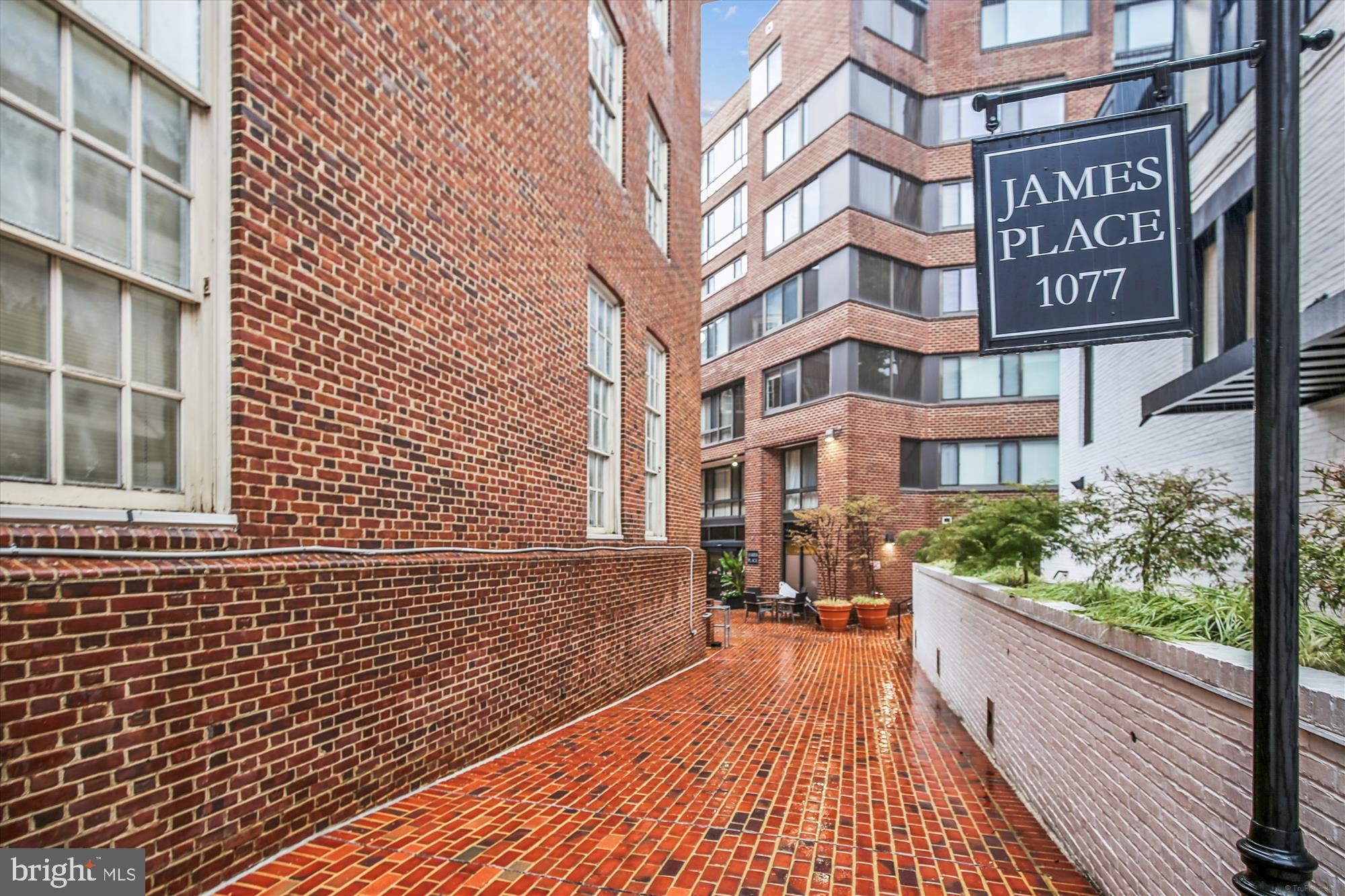 1077 30th Street Northwest, Unit 612 Washington, DC 20007 - Photo 3 of 44 a view of a brick building with many windows