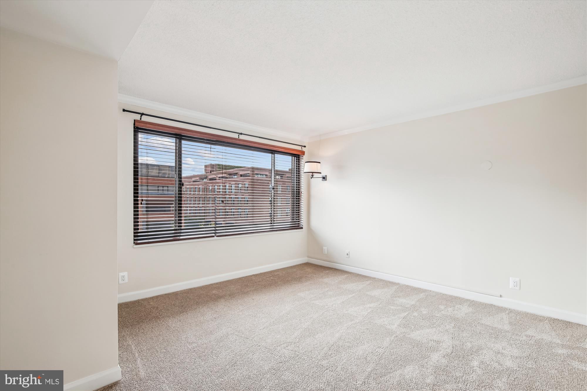 1077 30th Street Northwest, Unit 612 Washington, DC 20007 - Photo 32 of 44 a view of an empty room with a window
