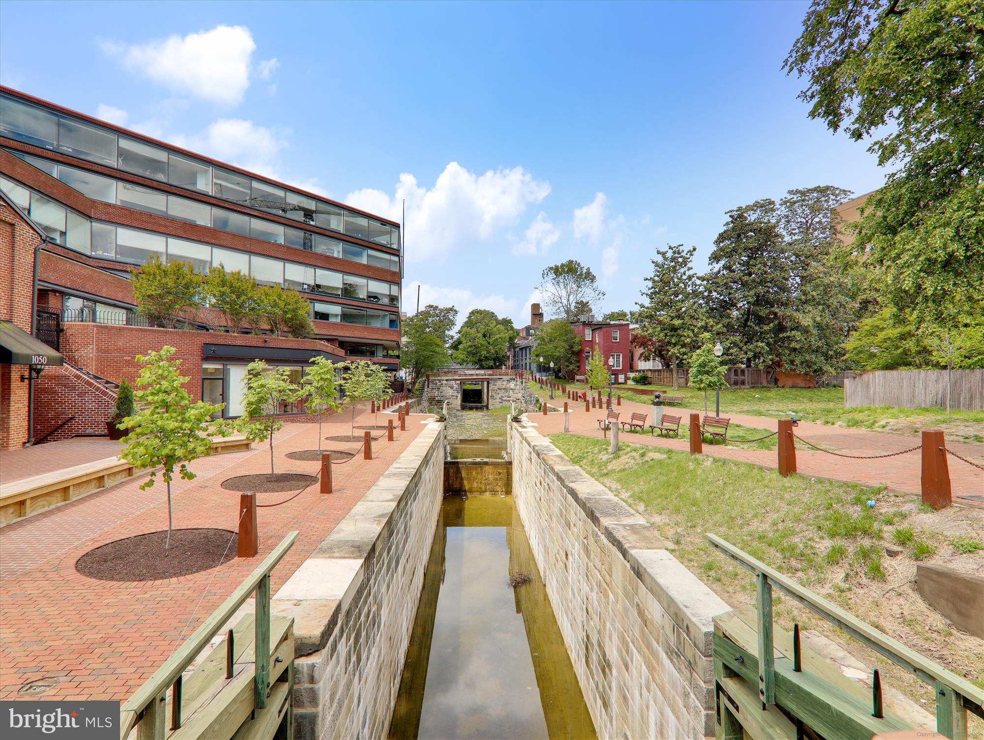 1077 30th Street Northwest, Unit 612 Washington, DC 20007 - Photo 42 of 44 a view of a swimming pool with a patio
