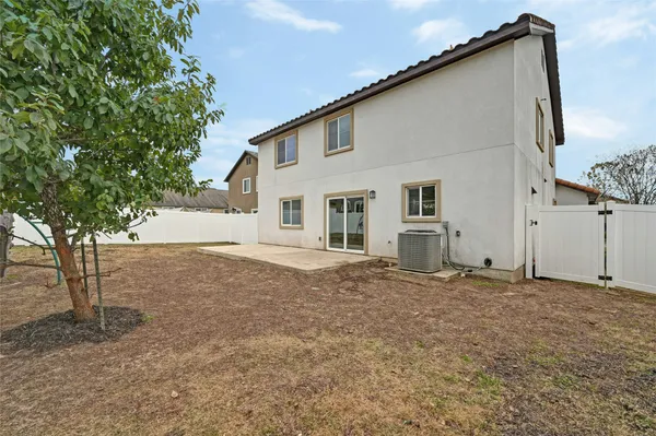a house with trees in front of it