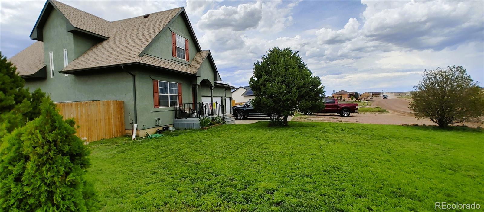 1451 Challenger Drive Pueblo West, CO 81007 - Photo 21 of 26 a house view with a garden space