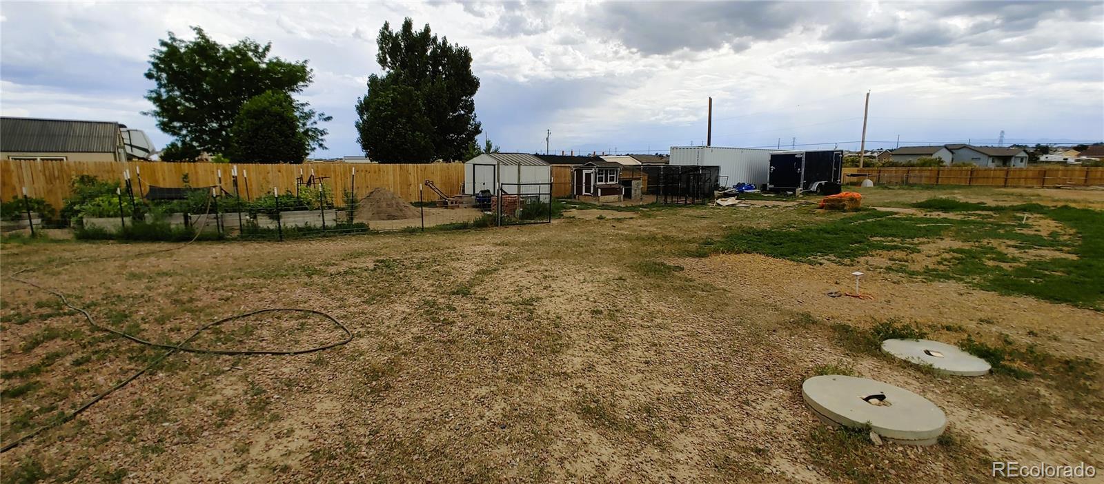 1451 Challenger Drive Pueblo West, CO 81007 - Photo 23 of 26 a view of outdoor space and yard