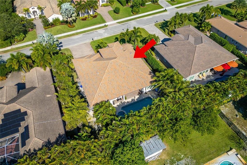 4940 Southeast Inlet Isle Way Stuart, FL 34997 - Photo 67 of 75 an aerial view of a house
