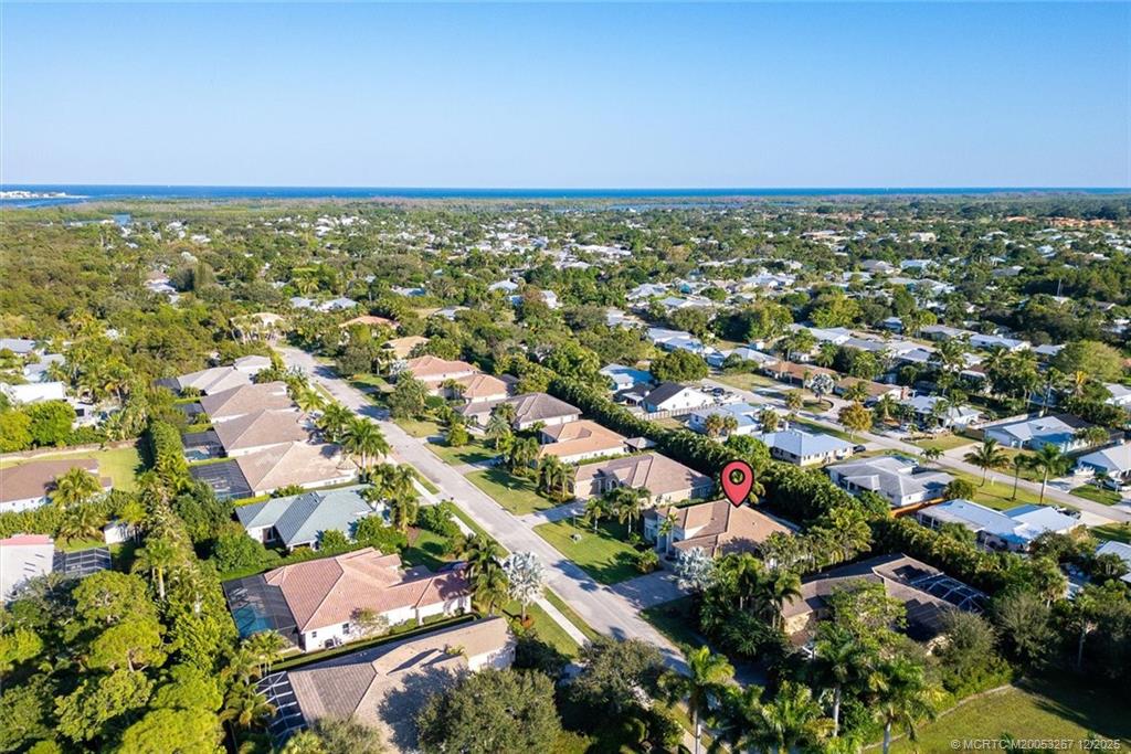 4940 Southeast Inlet Isle Way Stuart, FL 34997 - Photo 71 of 75 an aerial view of residential building and green space