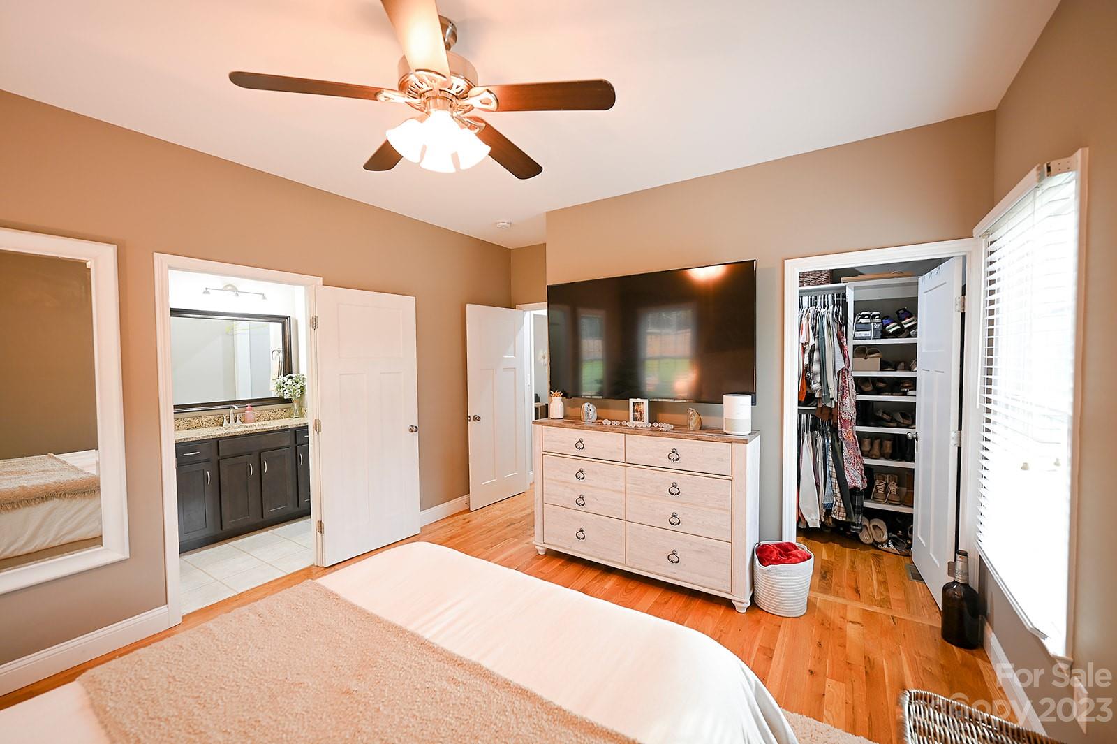 294 East High Road Bostic, NC 28018 - Photo 11 of 25 a bedroom with a bed dresser and flat screen tv