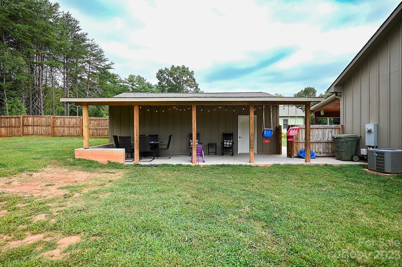 294 East High Road Bostic, NC 28018 - Photo 18 of 25 a view of a bedroom with furniture and a garden