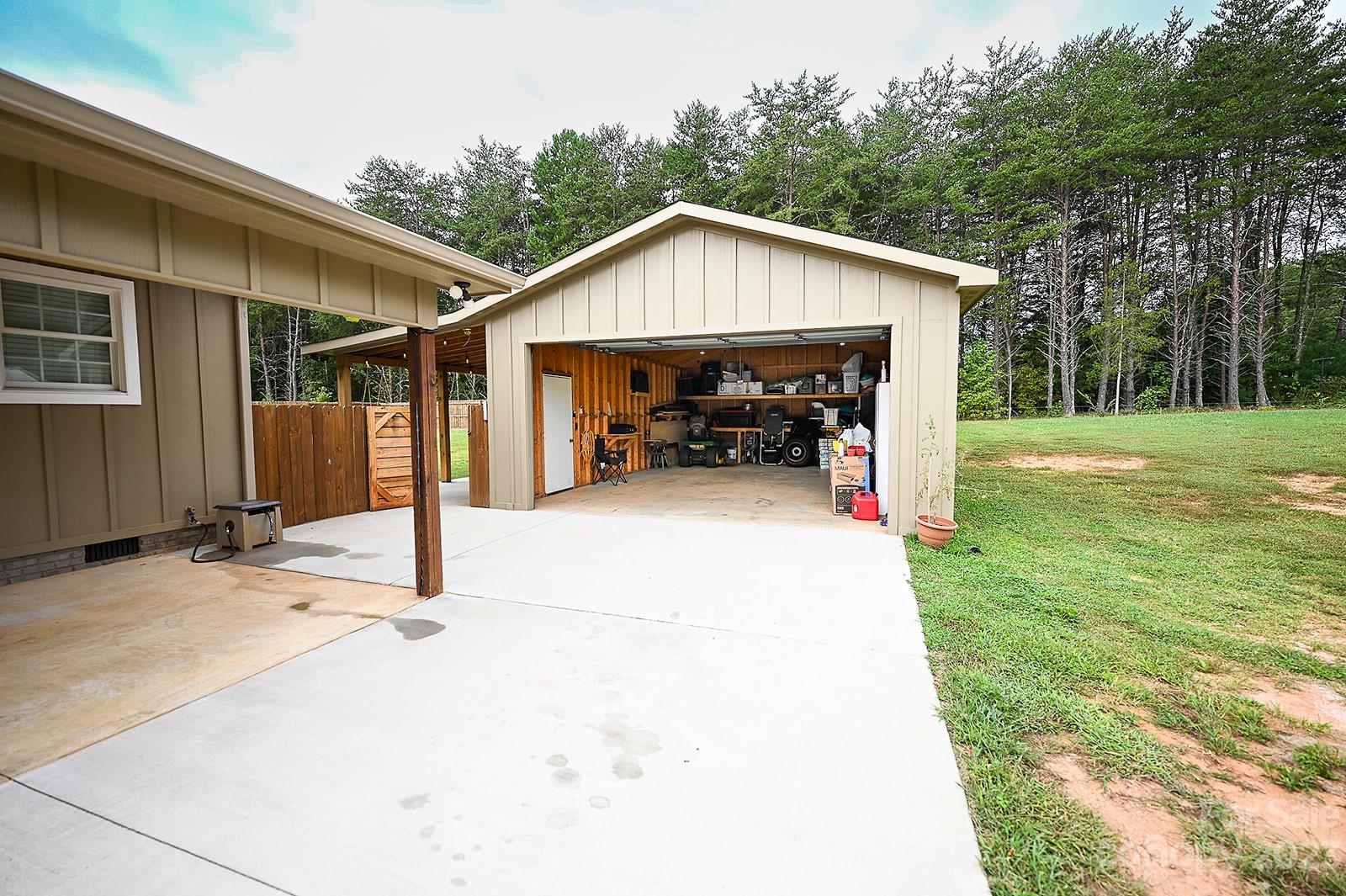 294 East High Road Bostic, NC 28018 - Photo 22 of 25 a view of a house with backyard and porch