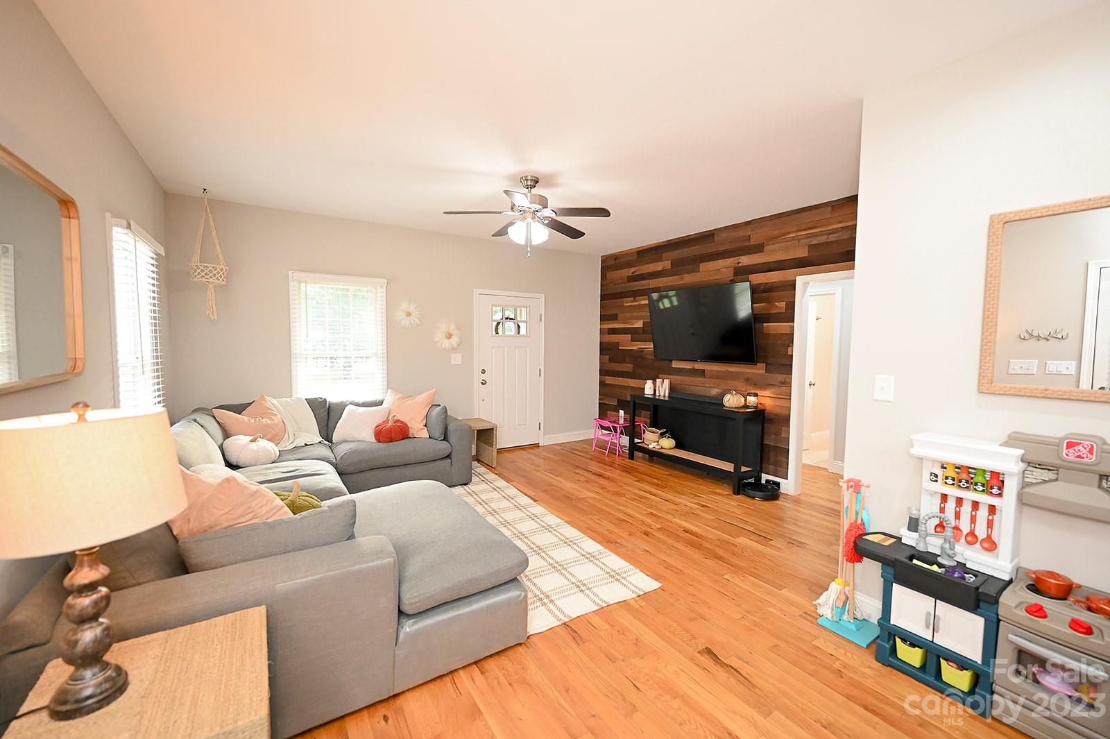 294 East High Road Bostic, NC 28018 - Photo 5 of 25 a living room with furniture and a flat screen tv