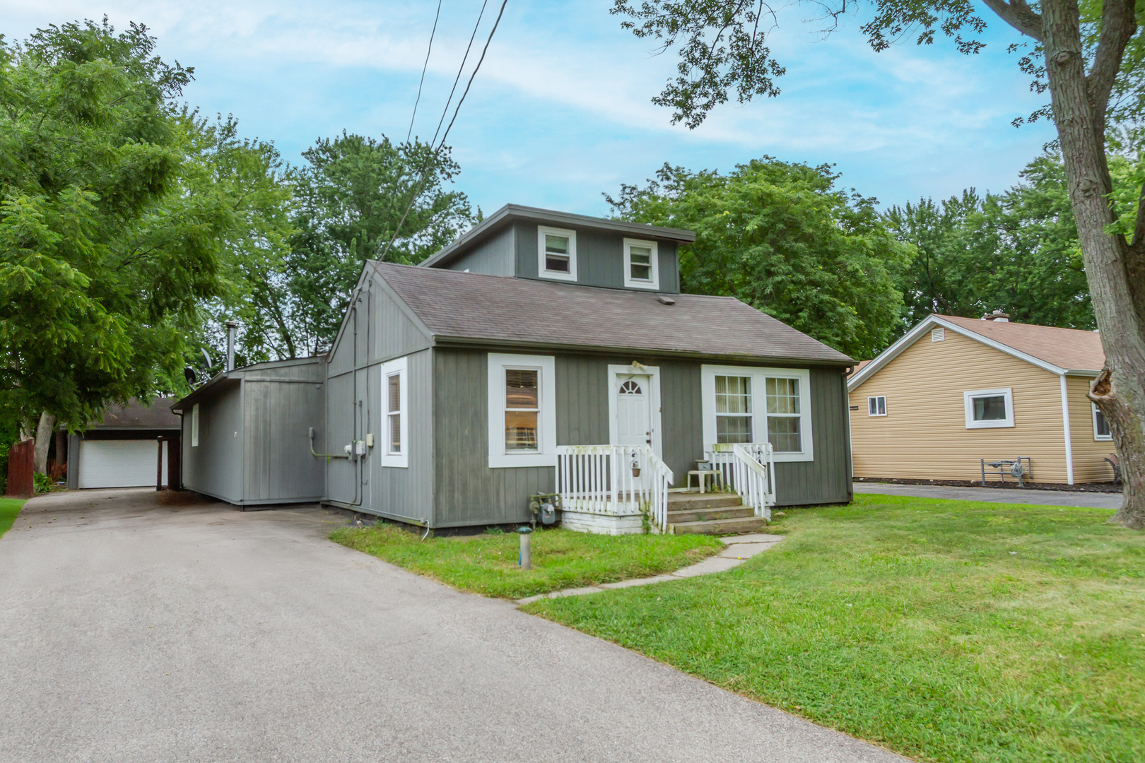 36379 Wesley Road Ingleside, IL 60041 - Photo 13 of 15 a front view of a house with garden