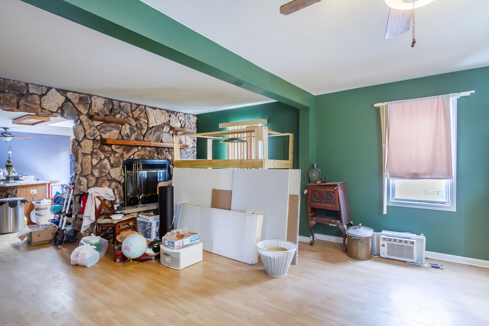 36379 Wesley Road Ingleside, IL 60041 - Photo 2 of 15 a room with lots of wooden furniture and a window