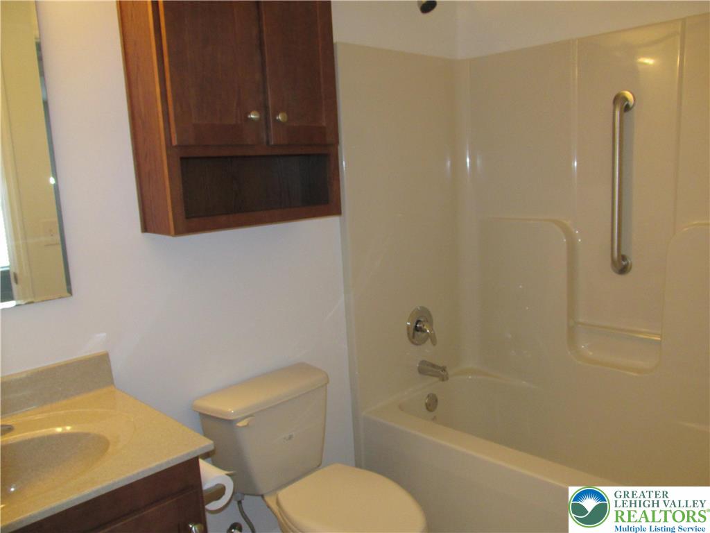 3813 Belcourt Road Easton, PA 18040 - Photo 20 of 25 a bathroom with a sink a toilet and bathtub