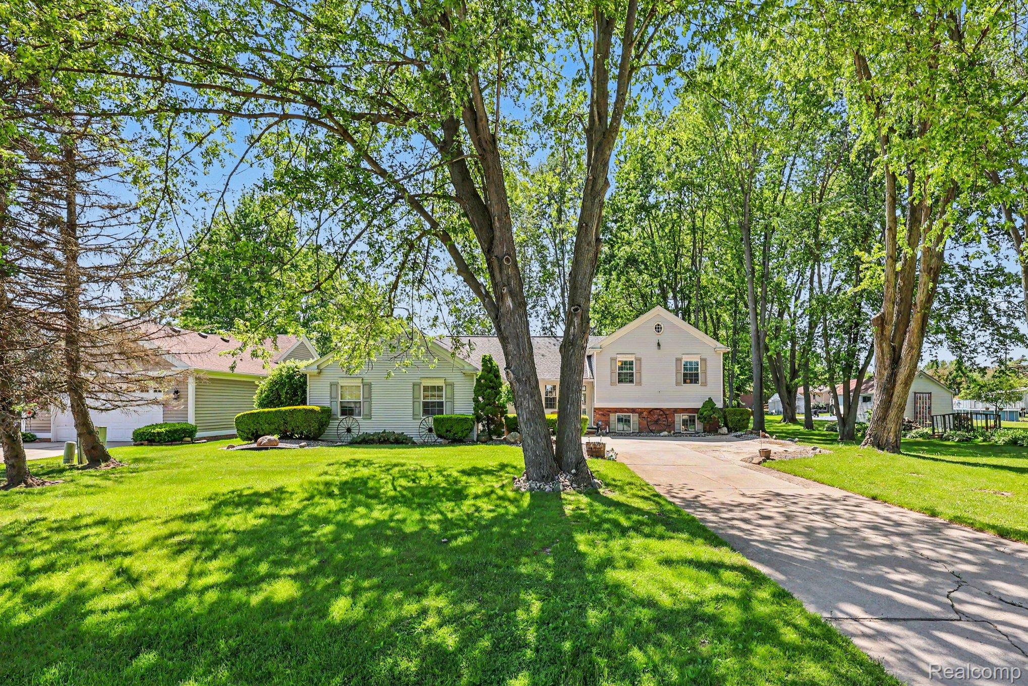 7020 Meldrum Road Fair Haven, MI 48023 - Photo 29 of 43 Traditional single-family residence featuring a split-level design and a paved driveway