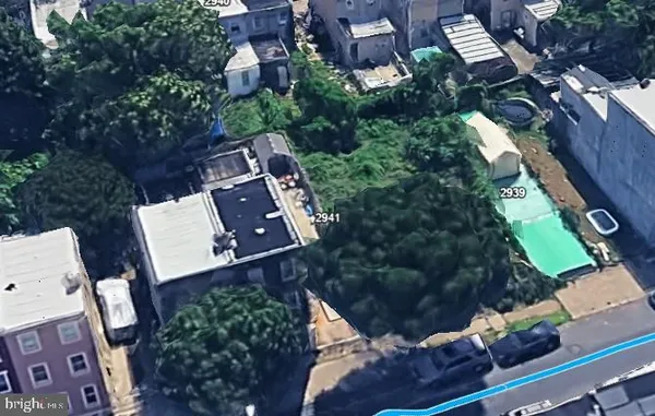 an aerial view of house with yard