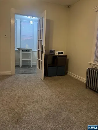 a room with furniture and a window