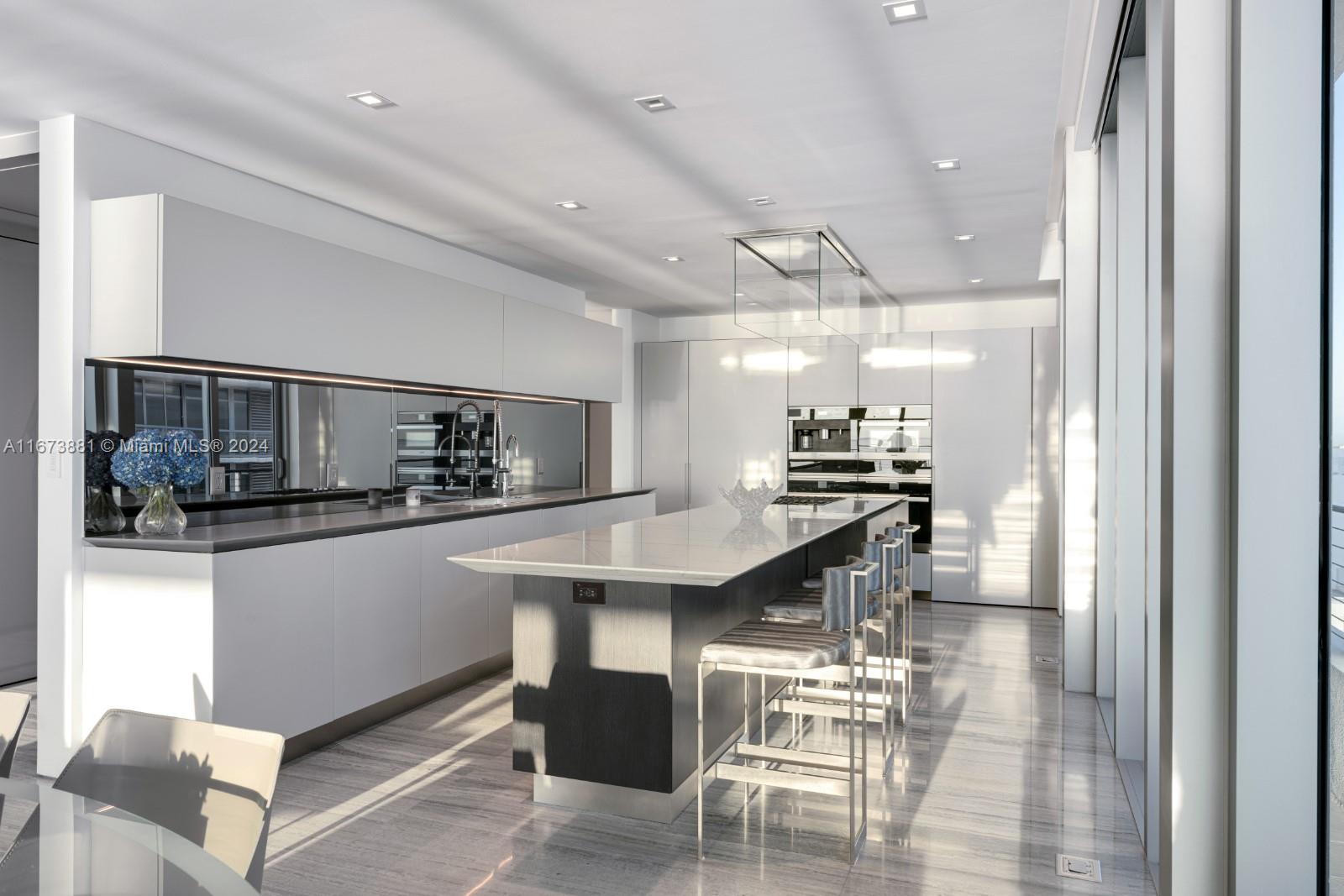 3651 Collins Avenue, Unit 800 Miami Beach, FL 33140 - Photo 15 of 33 a kitchen with counter top space and appliances