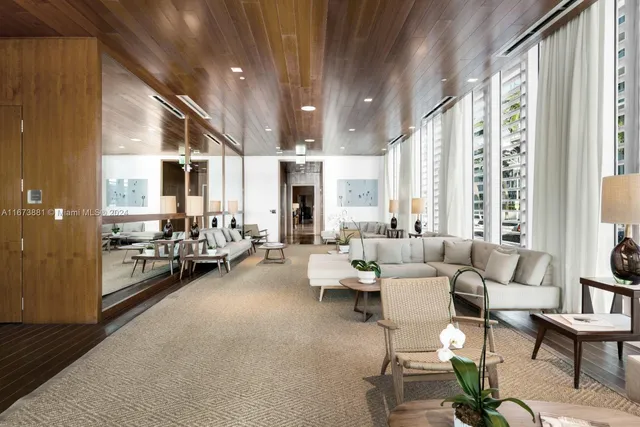 a view of a room with lots of gym equipment