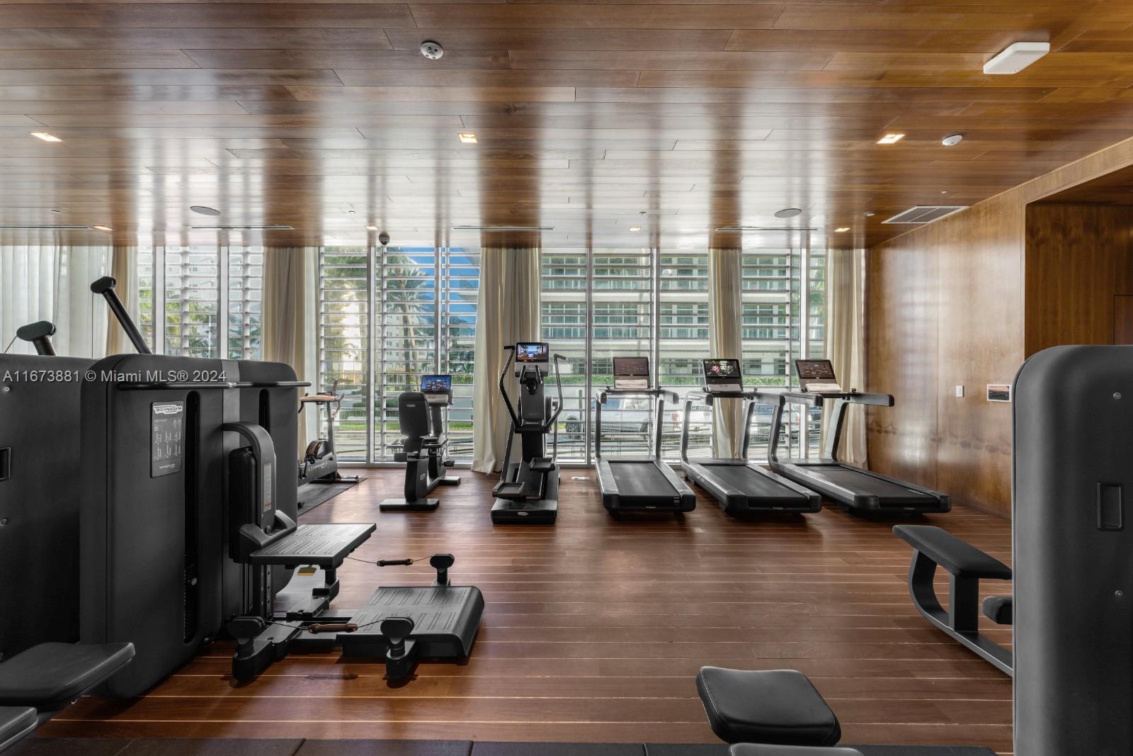 3651 Collins Avenue, Unit 800 Miami Beach, FL 33140 - Photo 33 of 33 a view of a workspace with furniture and a window