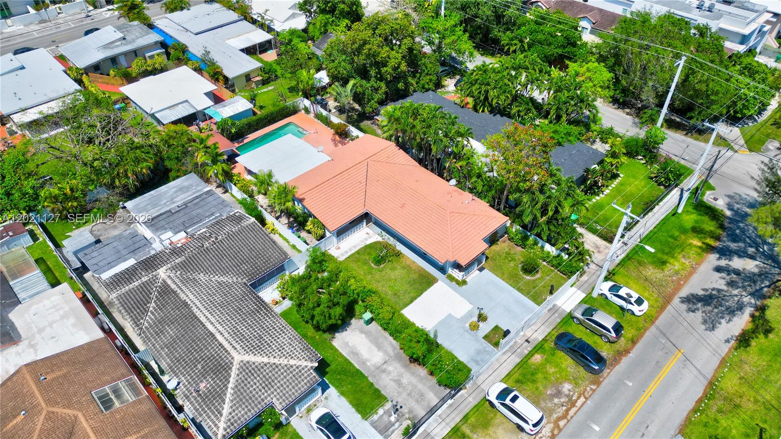 3611 Southwest 23rd Street Miami, FL 33145 - Photo 51 of 56 Aerial view of 3611/3613 SW 23 Street, Miami, FL 33145 - Gated duplex property 0n 9,000 sf lot, with parking inside and outside, lushly landscaped, nice yard and pool