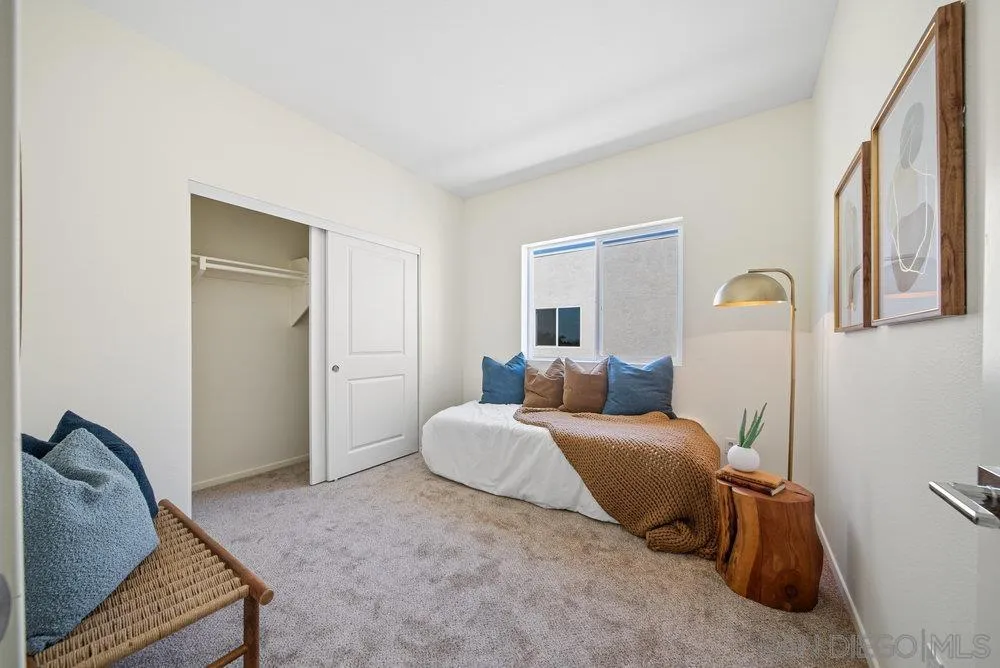 8180 Golden Avenue Lemon Grove, CA 91945 - Photo 29 of 48 a bedroom with a bed and a window