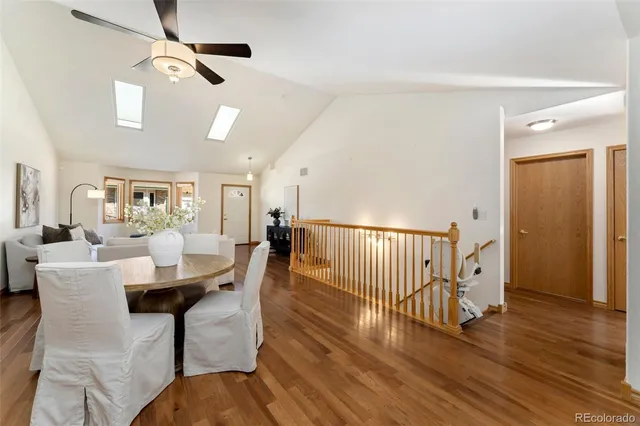 a kitchen with granite countertop a center island stainless steel appliances cabinets and a window