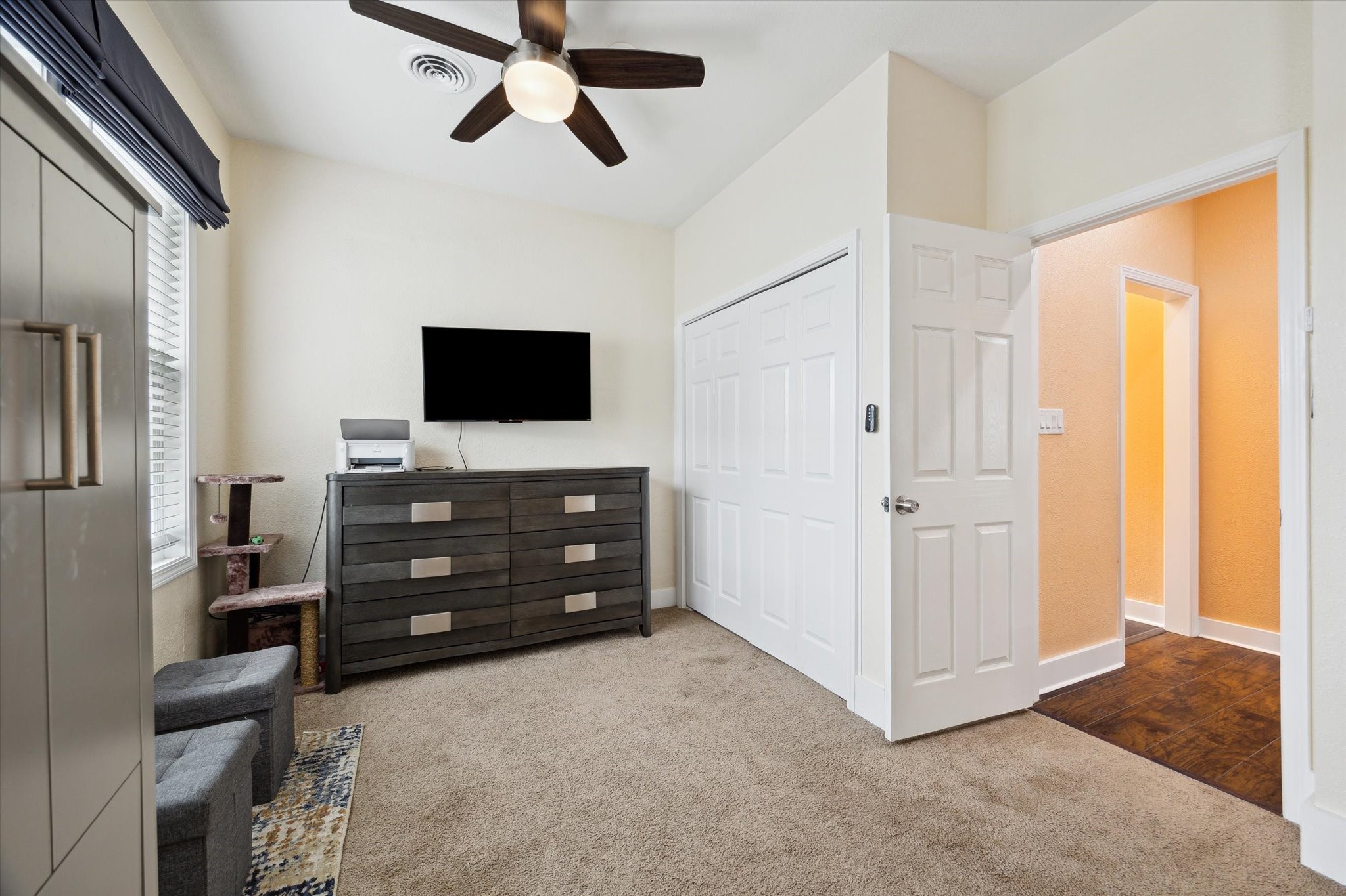 4109 Avenue R Galveston, TX 77550 - Photo 8 of 18 Spacious primary bedroom with ample natural light and modern finishes.