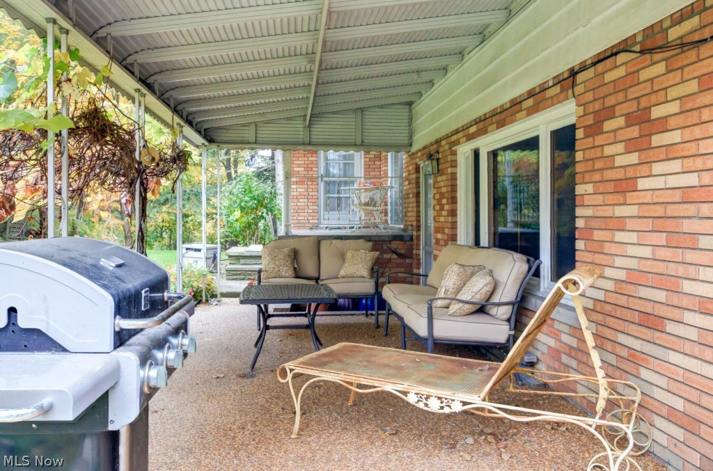 4949 Brainard Road Orange, OH 44022 - Photo 20 of 24 Naturestone patio overlooks deep yard...