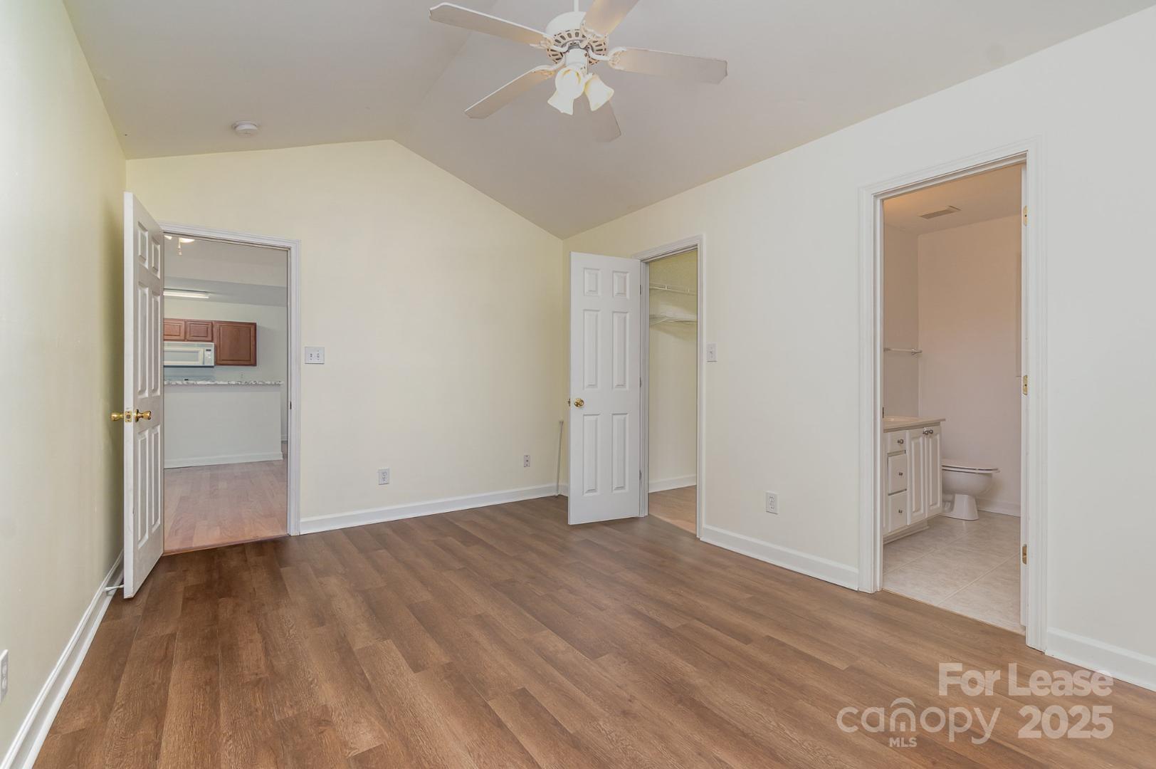 2716 Rabbit Ridge Drive Bessemer City, NC 28016 - Photo 8 of 15 wooden floor in an empty room with a window