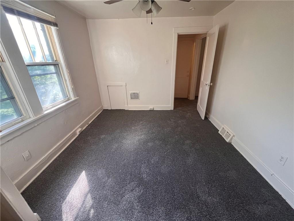460 Reed Street, Unit 2L Pittsburgh, PA 15221 - Photo 10 of 13 a view of a livingroom with an empty space and a window