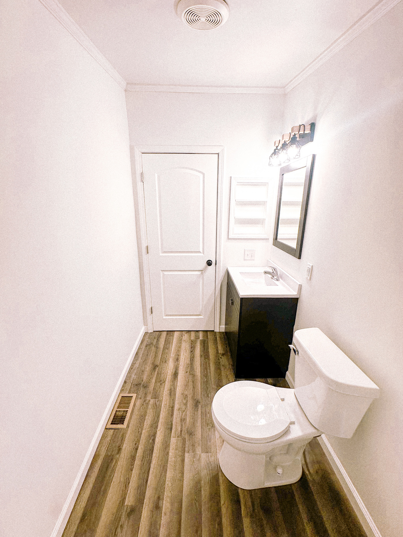 4920 Mt Moriah Road Galatia, IL 62935 - Photo 21 of 33 a bathroom with a sink a toilet and mirror