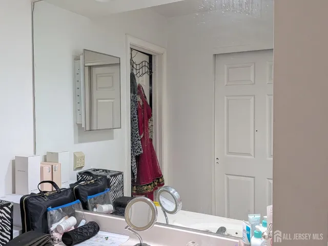 a bathroom with a bathtub and a toilet