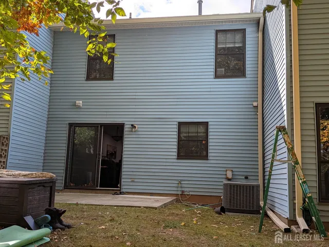 a view of a house with a door and chair