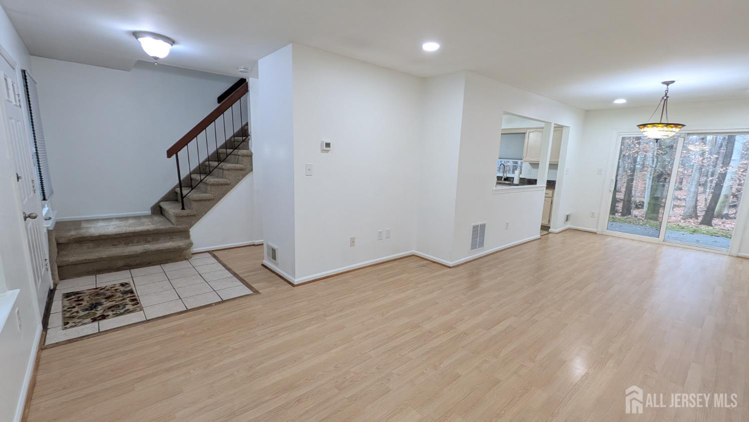 2103 Timber Oaks Road Edison, NJ 08820 - Photo 2 of 14 a view of an entryway with wooden floor