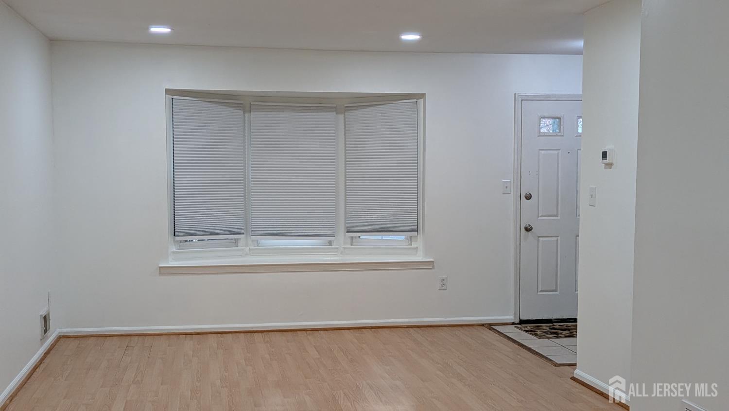 2103 Timber Oaks Road Edison, NJ 08820 - Photo 4 of 14 a view of an empty room with window